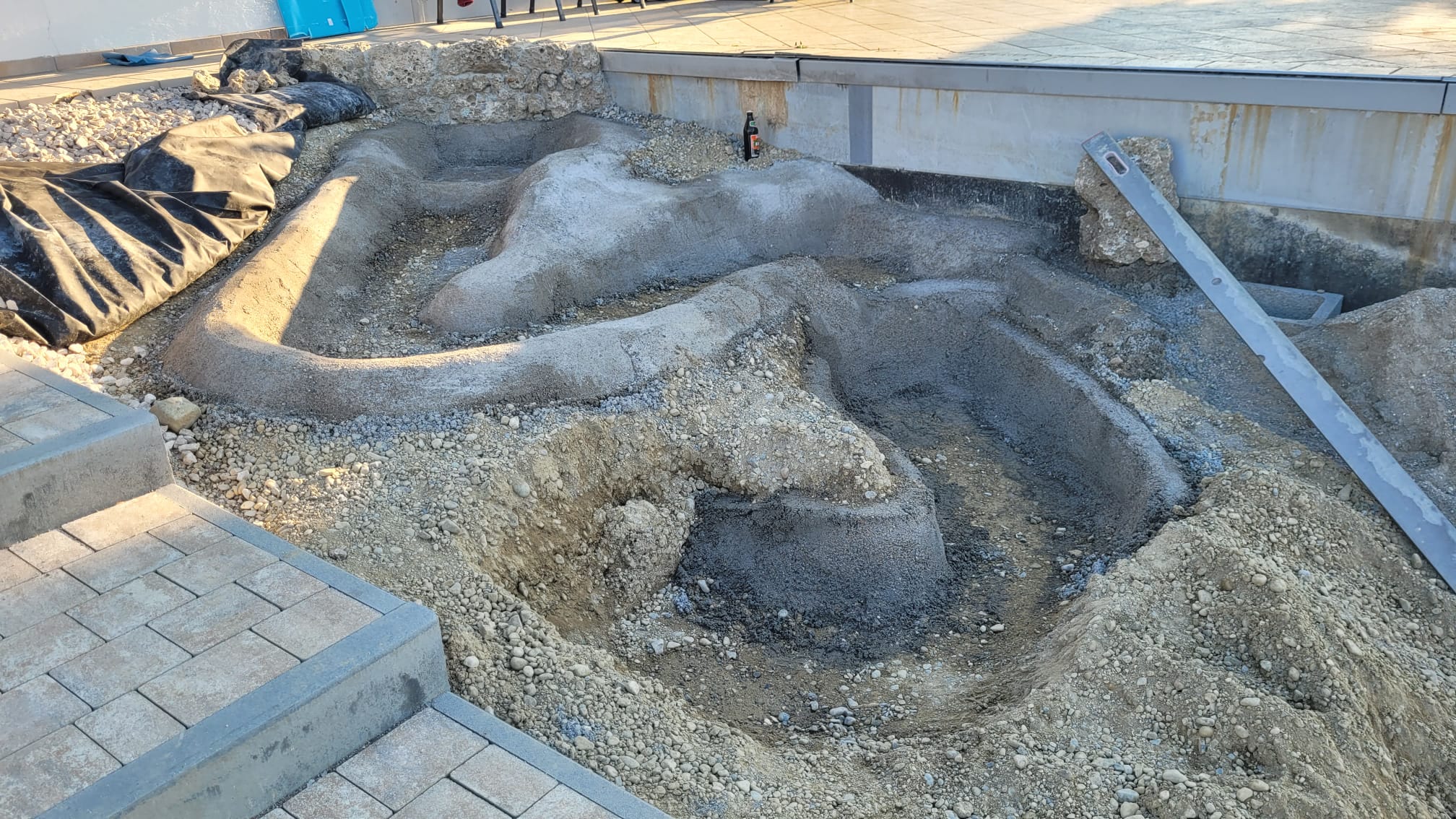 Neuanlage eines Hausaufgangs und Gestaltung eines Flusslaufs in Bad Aibling und im Landkreis Rosenheim