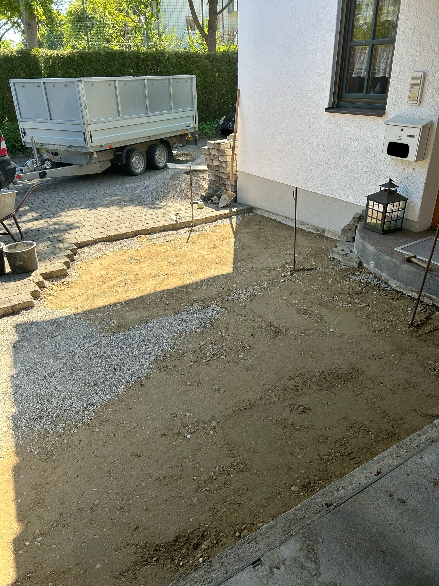 Ausbesserungsarbeiten einer Garagenzufahrt mit Pflasterarbeiten in Bad Aibling und im Landkreis Rosenheim